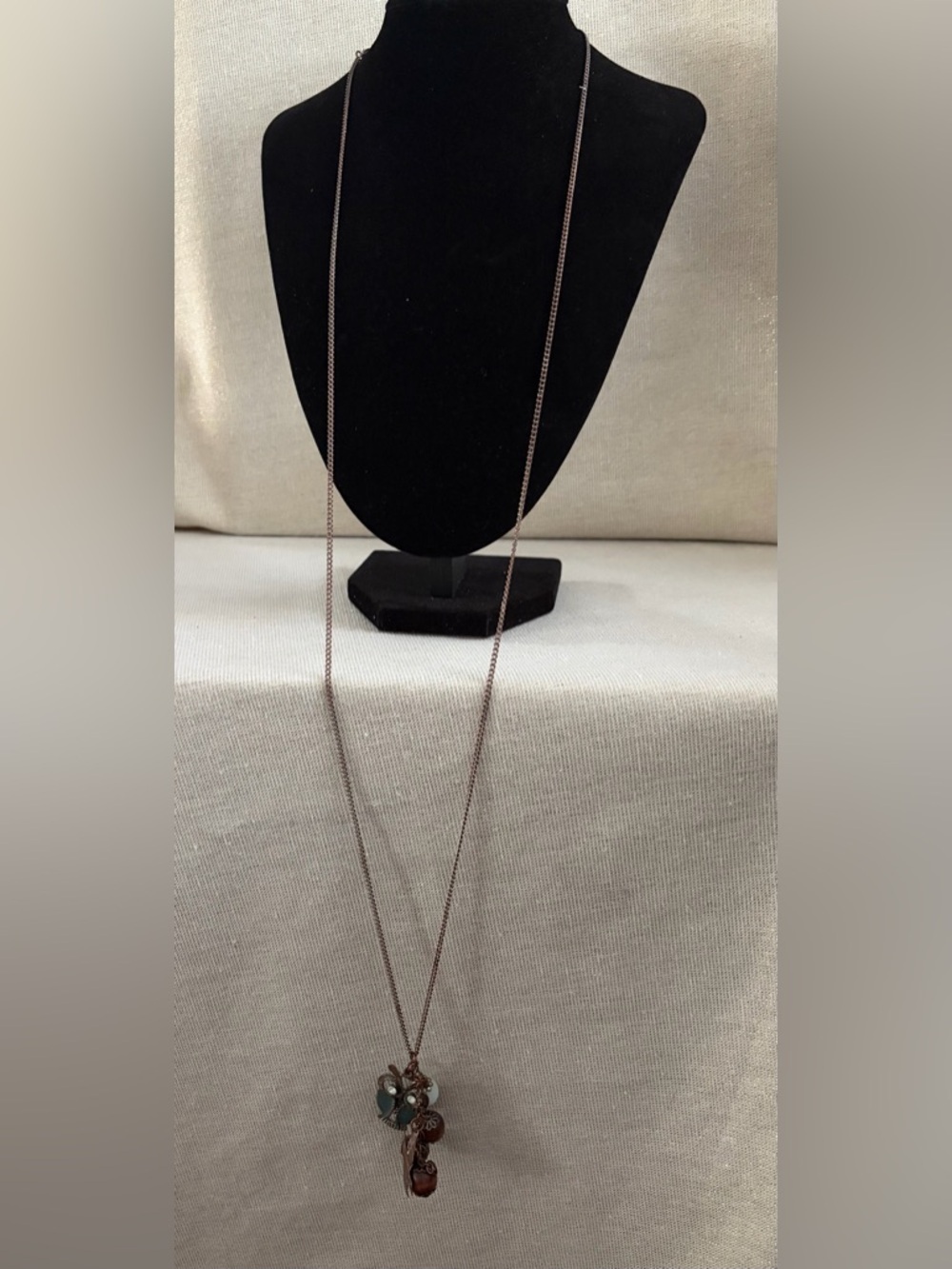 Long Brown Pendant Necklace with Bead Charms